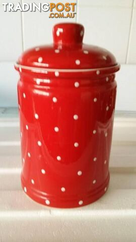 red and white poka dot cannister