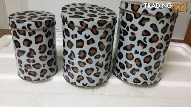 3 tins canisters ranging in size
