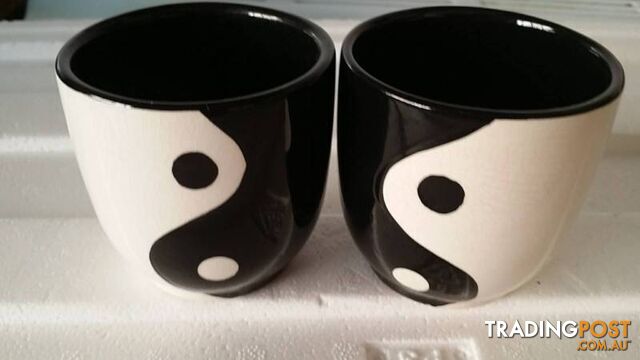 2 ying and yang candle holders