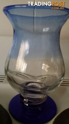 glass vase with blue base and top