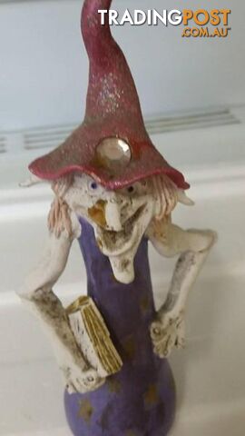crazy old wizard figurine