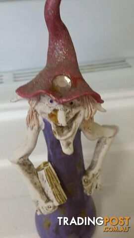 crazy old wizard figurine