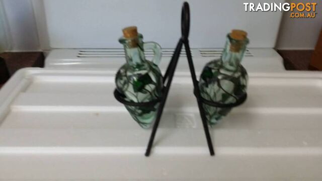 oil and vinegar bottles on a stand