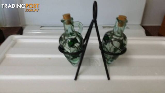 oil and vinegar bottles on a stand