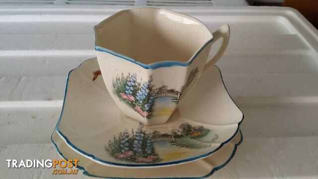 tea cup with saucer and plate