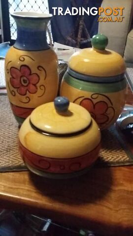 2 decorative cannisters and vase