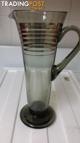 tall grey glass jug