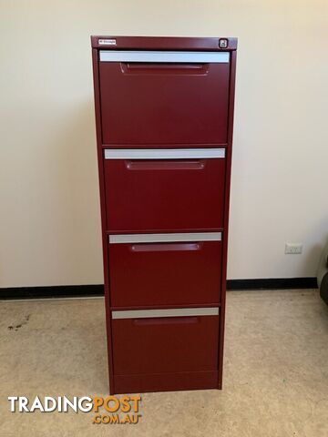 Red, 4 drawer, locking filing cabinet with key. As new condition.