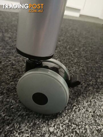 Table/s - height adjustable with castors and brakes.