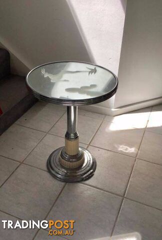 Glass pedestal table