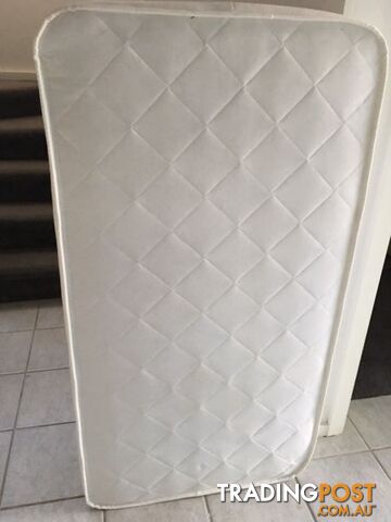 White cot mattress