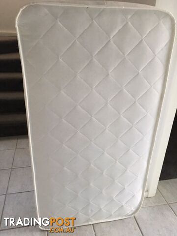 White cot mattress