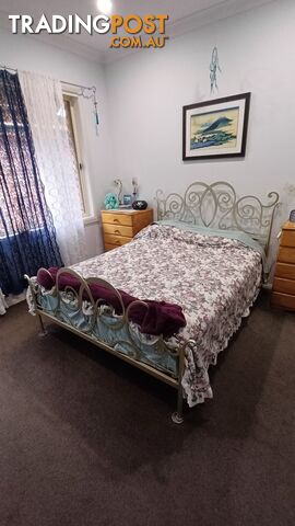 Silver wrought iron double bed