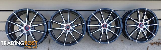 4 x AUSCAR 205/65 R16 Alloy Wheels suit Ford and Toyota 5 stud hubs.