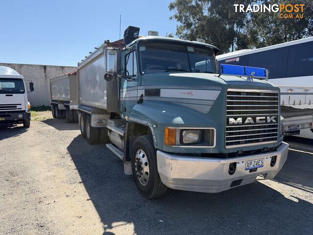 2003 Mack Fleet-Liner Tipper Truck and 2004 BORCAT TIPPER DOG