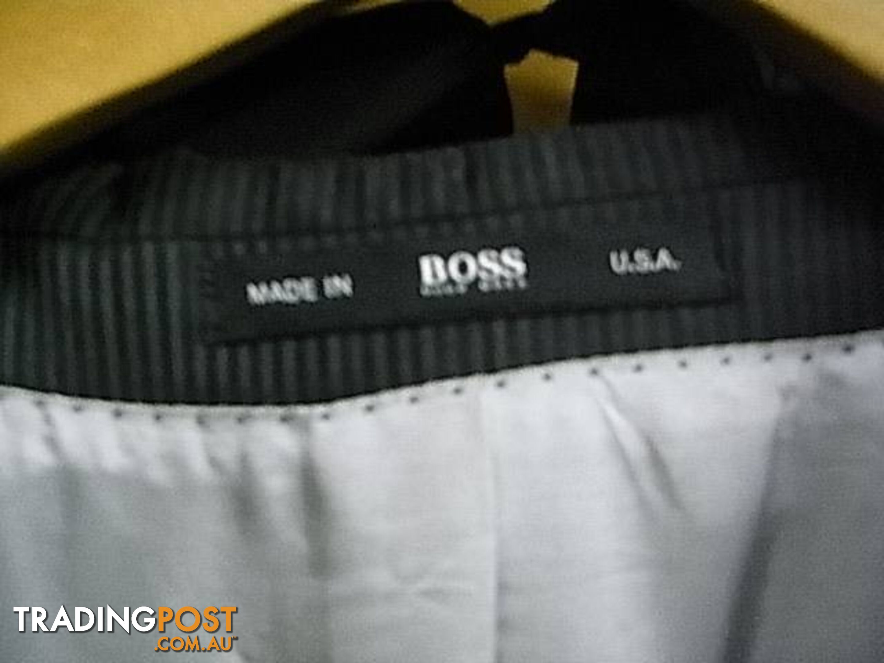 HUGO BOSS SUIT MADE IN USA. JACKET SIZE 44L pants 34 inch EXCEL