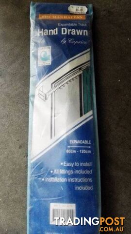 2 brand new curtain expandable tracks $10 for 2