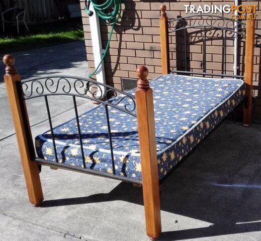 solid timber and metal frame single bed with mattress