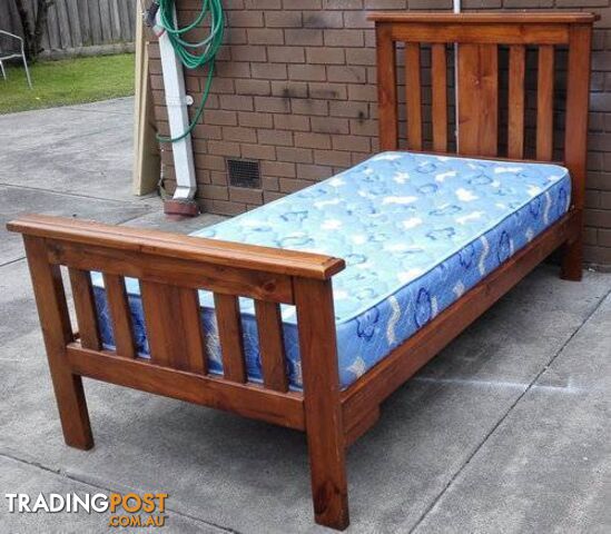 2 x solid timber single bed with mattress, $140each