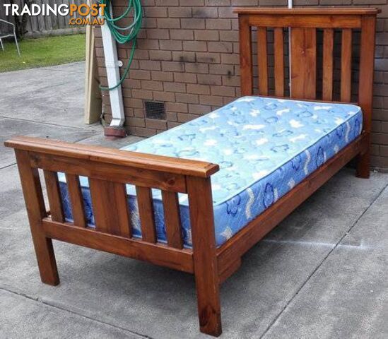 2 x solid timber single bed with mattress, $140each