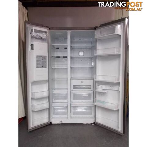 LG 659 liter fridge ice maker/water without plumbing - photo 2 of 2