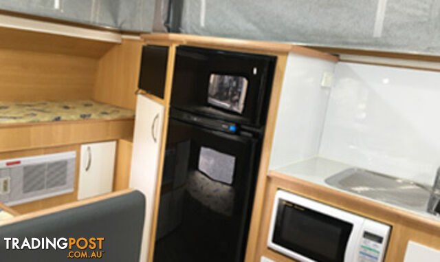 CARAVAN REPAIRS AND CONVERSIONS, AIR CONDITIONER AND MICROWAVE OVEN INSTALLATION