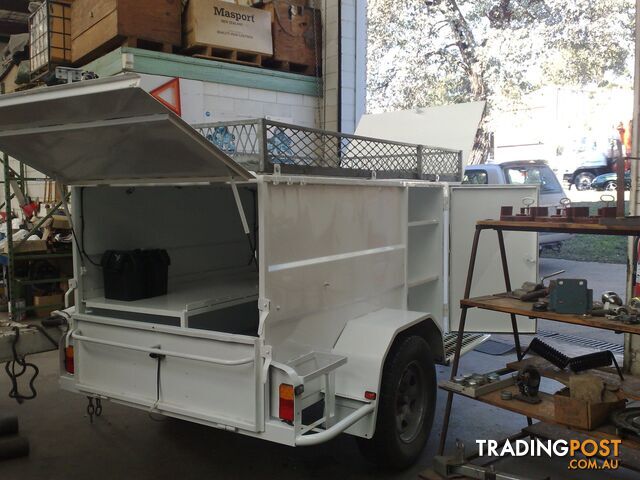 ENCLOSED TRADESMAN TRAILER RANGE PAINTED - photo 4 of 11