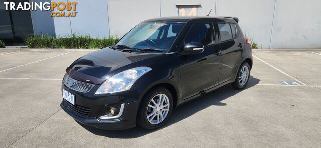 2014 Suzuki Swift FZ NAVIGATOR Sedan Automatic - photo 3 of 13