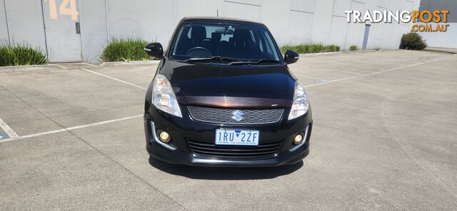 2014 Suzuki Swift FZ NAVIGATOR Sedan Automatic - photo 2 of 13