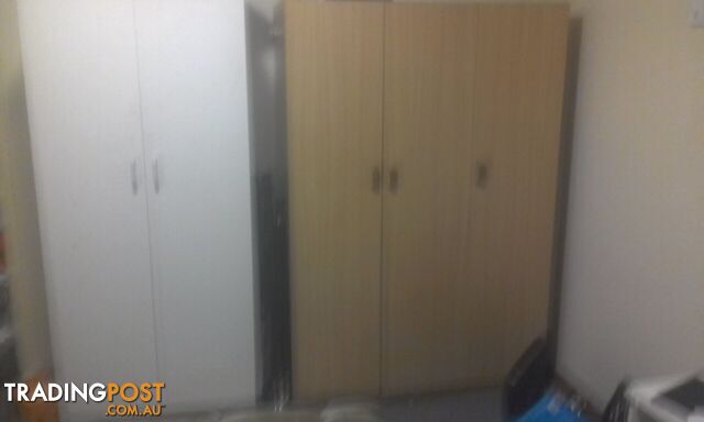 Light brown chipboard wardrobe $70 ono negotiable excellent cond