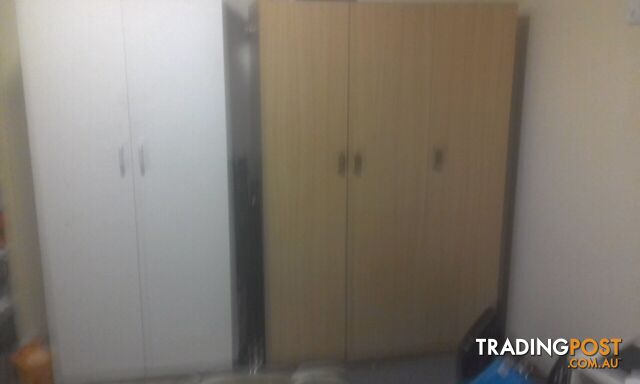 Light brown chipboard wardrobe $70 ono negotiable excellent cond