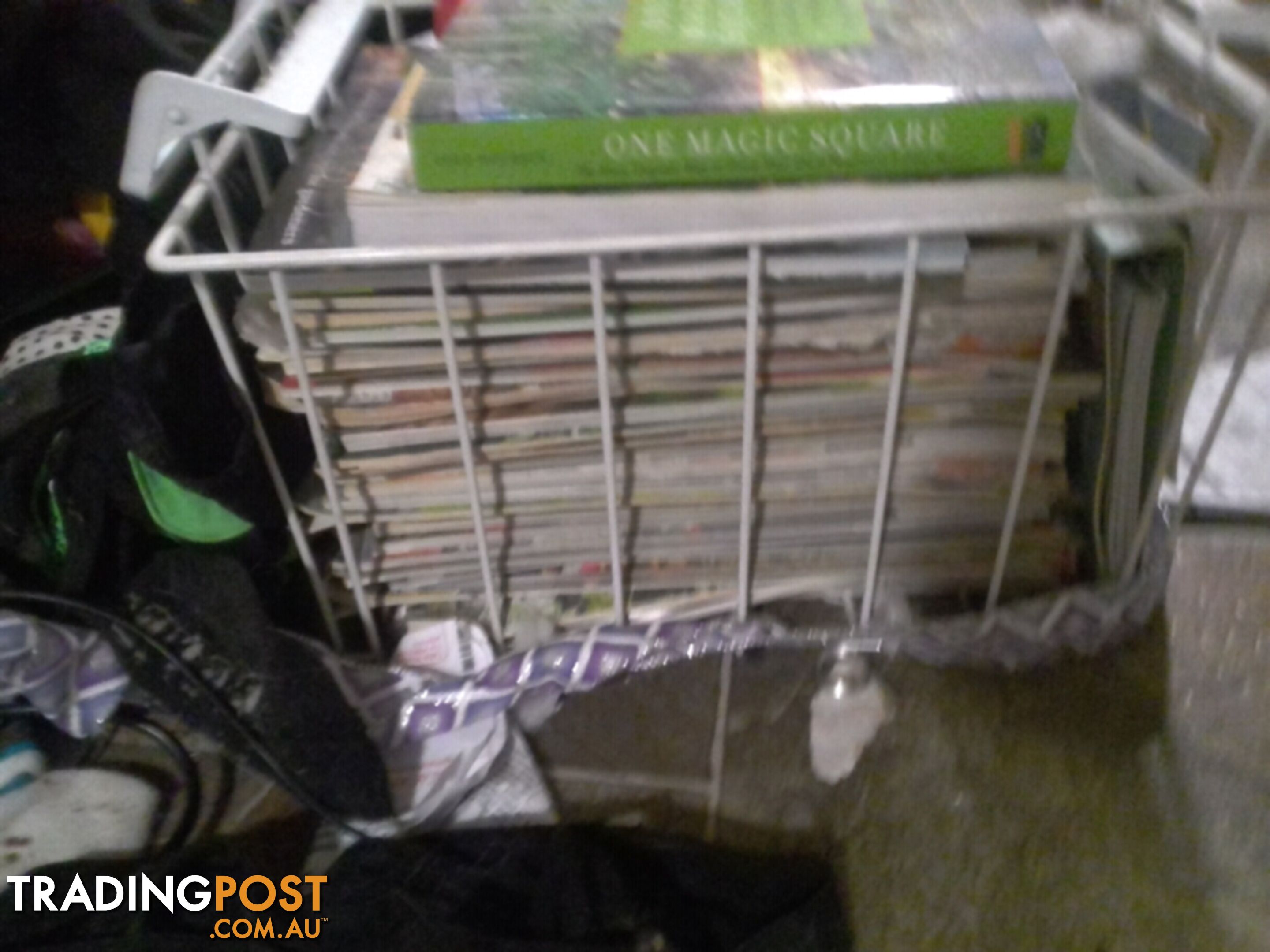 big stack of gardening magazines and books