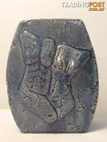 Blue vase with male & female torso
