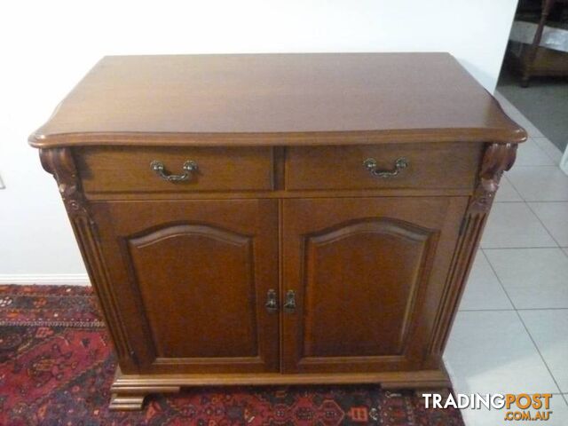 2 Door 2 Drawer Cabinet with fluted columns and carved decoration