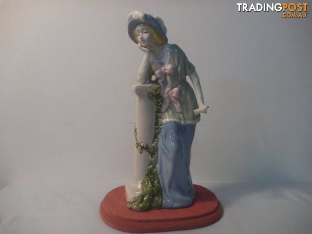 Girl standing beside pillar Figurine (2 Available)