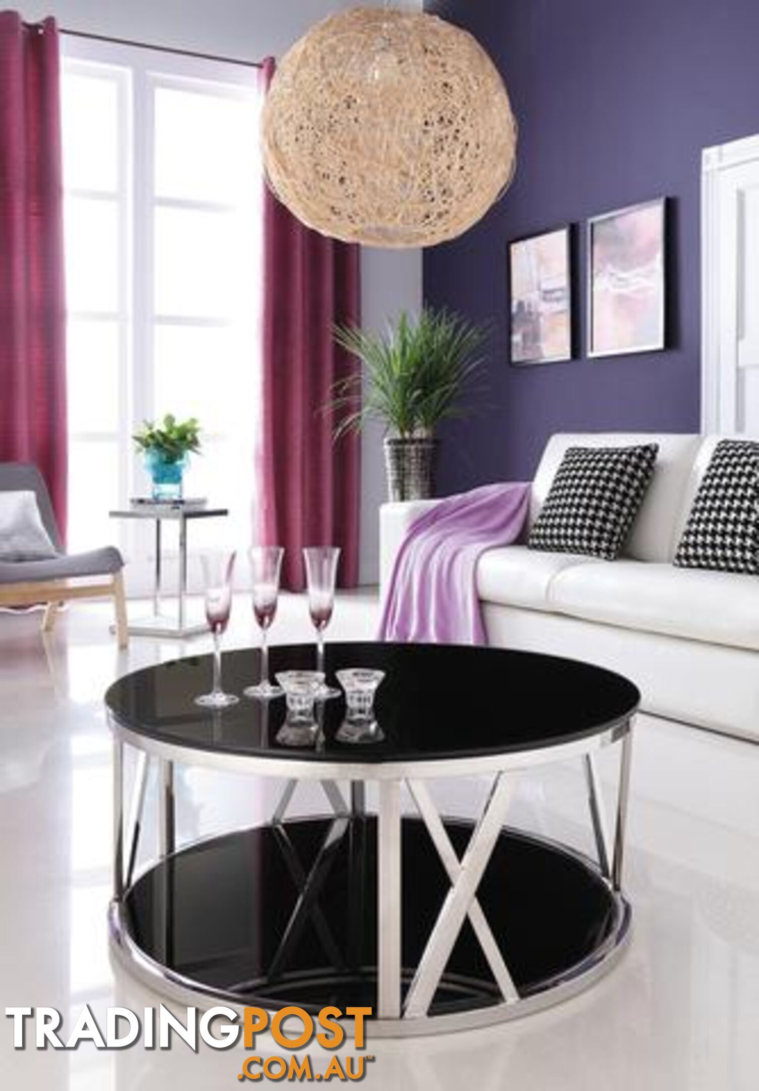 Kavir Polished Stainless Steel Round Coffee Table With Black Tempered Glass.