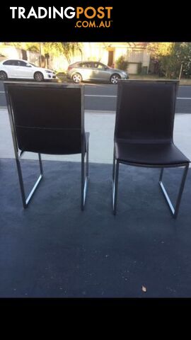 Wanted: 2 brown leather chairs with strong stainless steel legs
