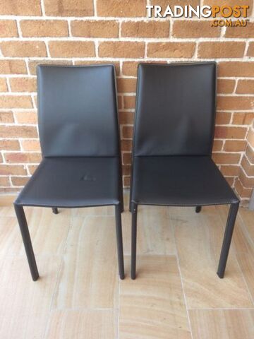 Wanted: Two black leather chairs