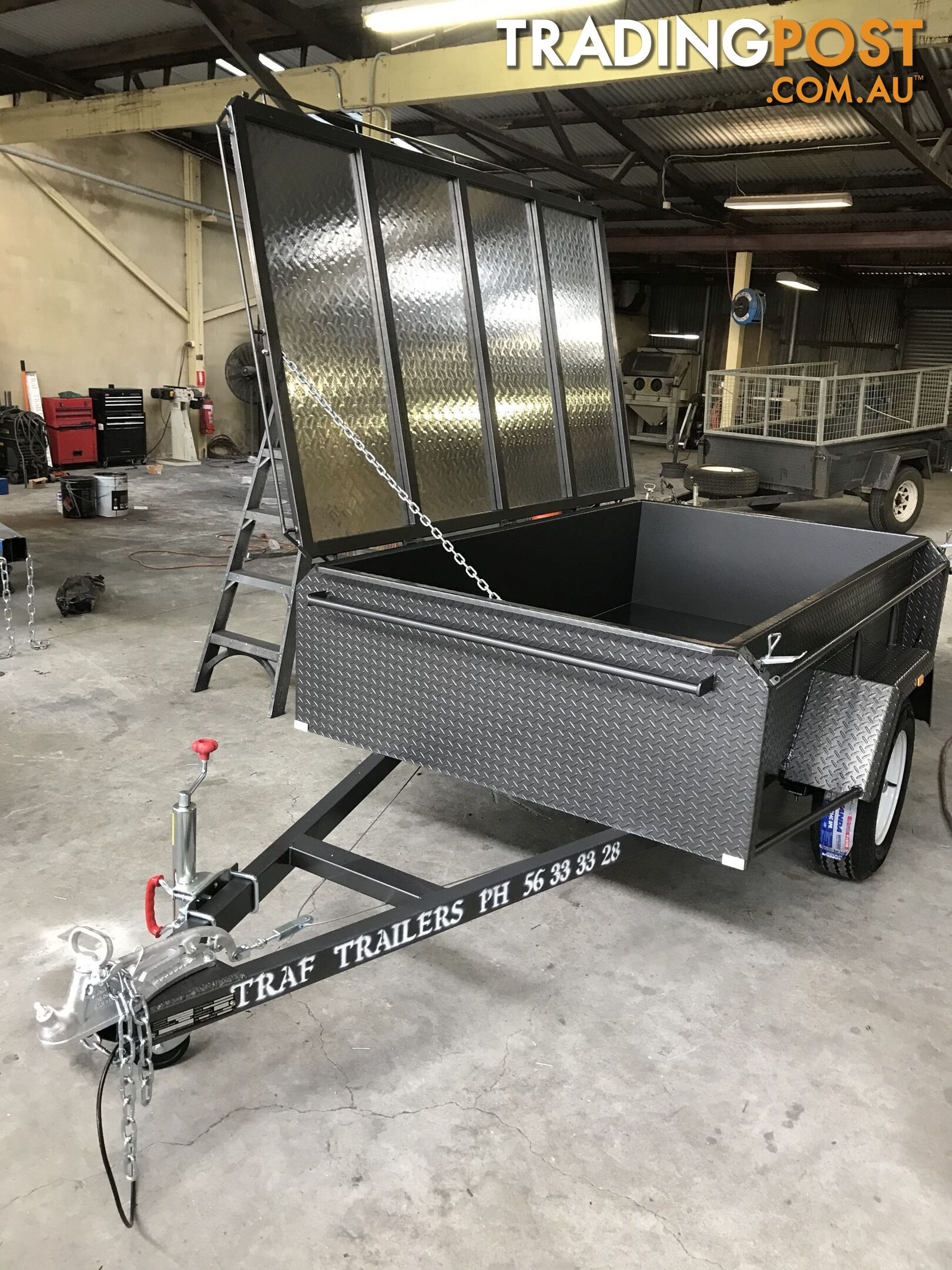 CUSTOM TRAILERS