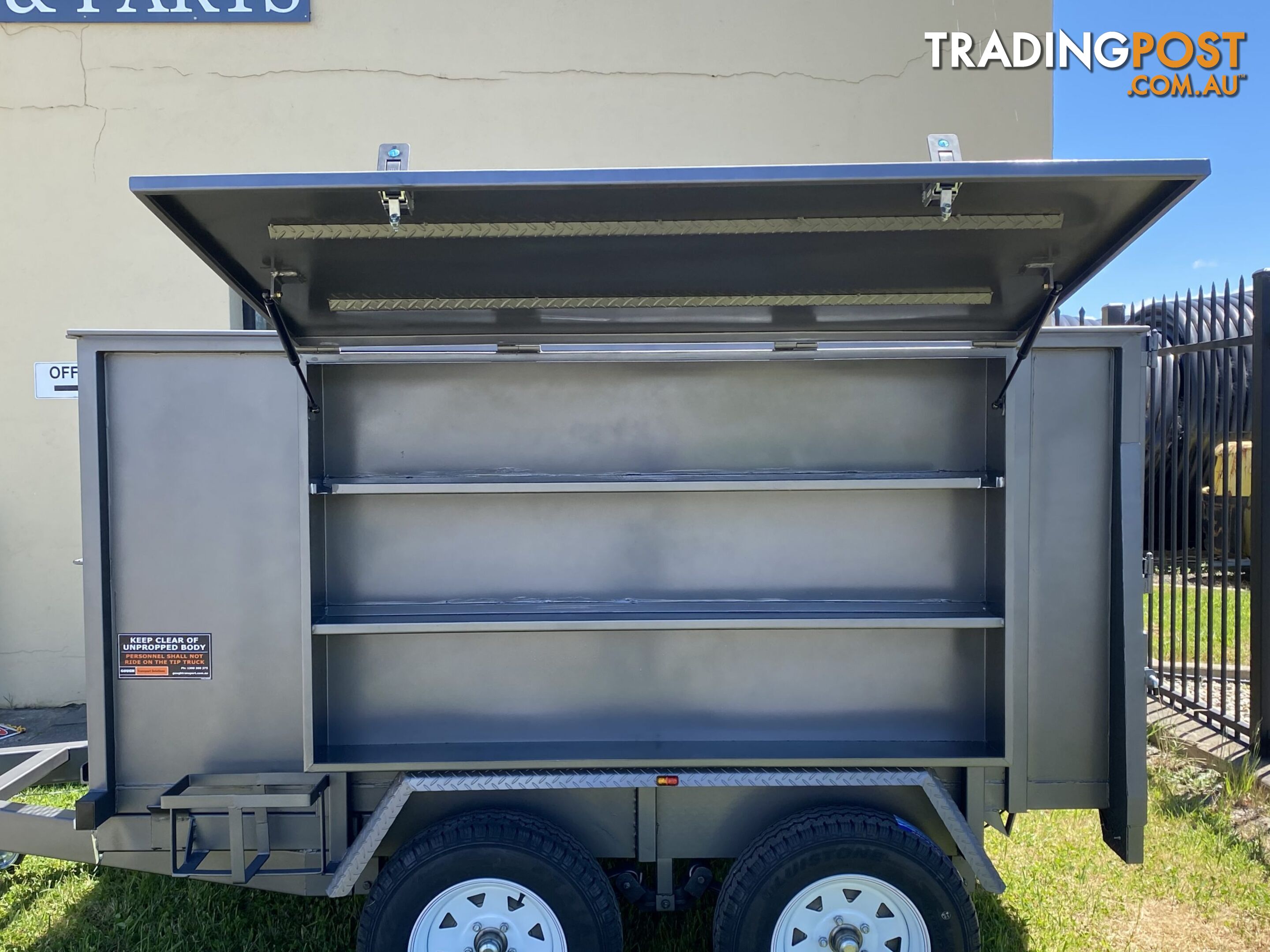 CUSTOM TRAILERS