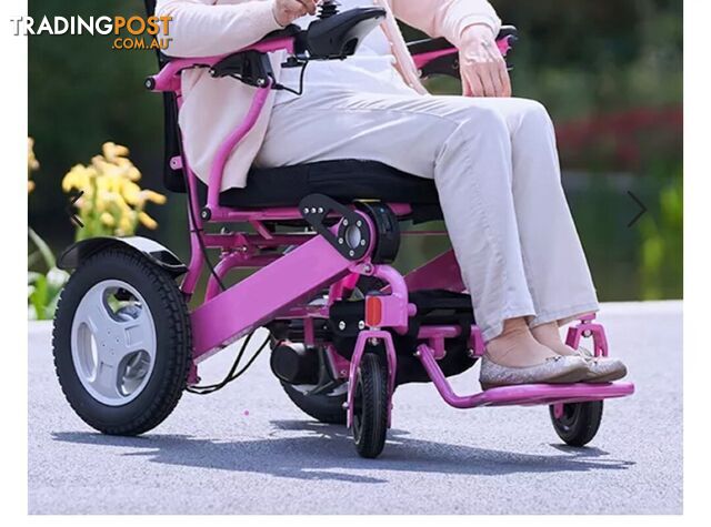 Assembled but unused Pink Falcon Electric Wheelchair