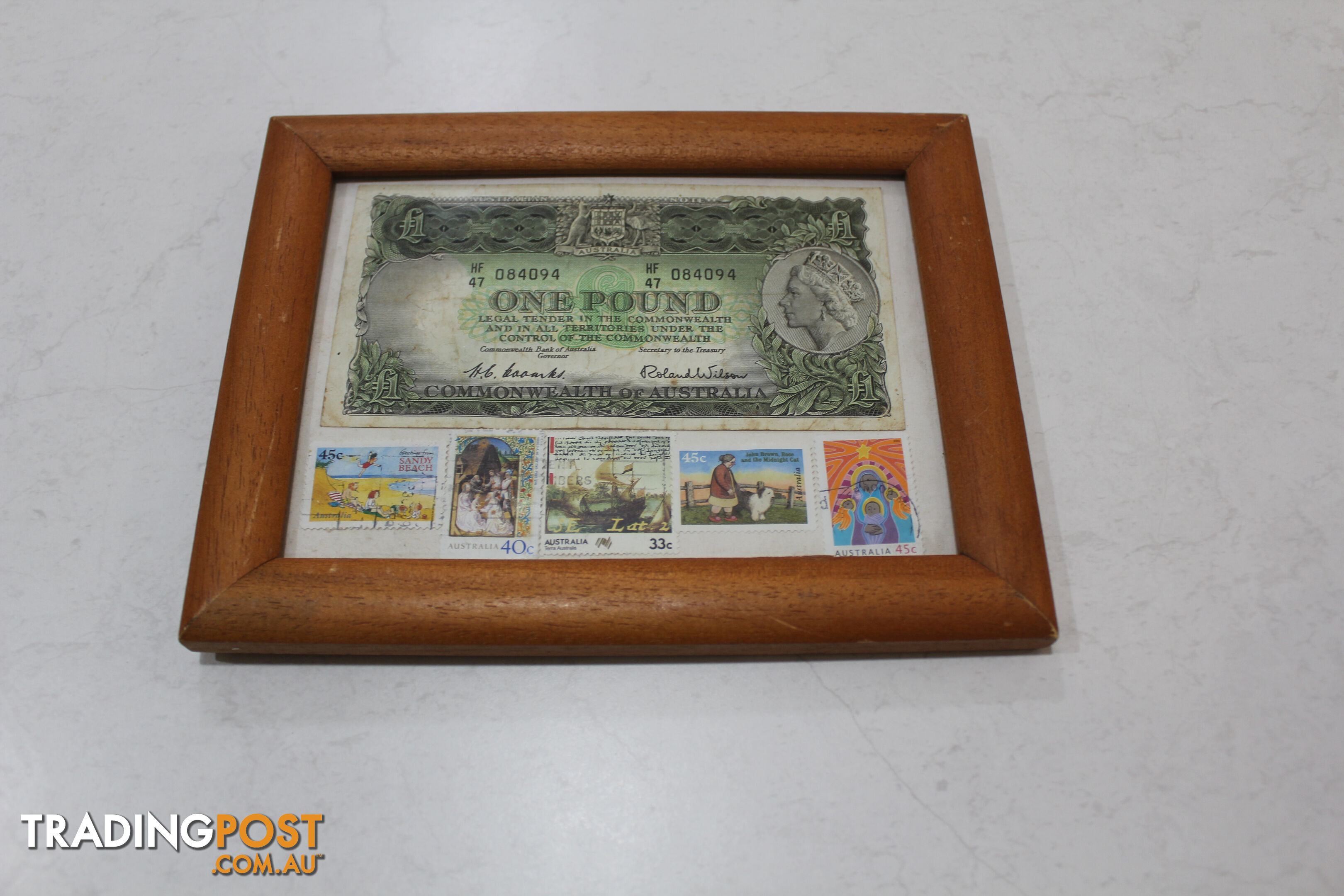 Australian Pound note and old stamps