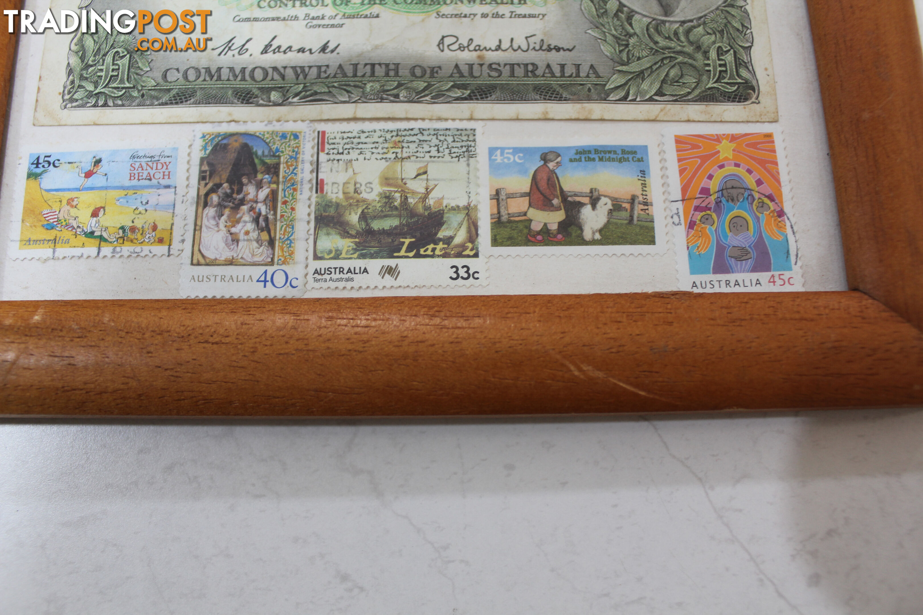 Australian Pound note and old stamps