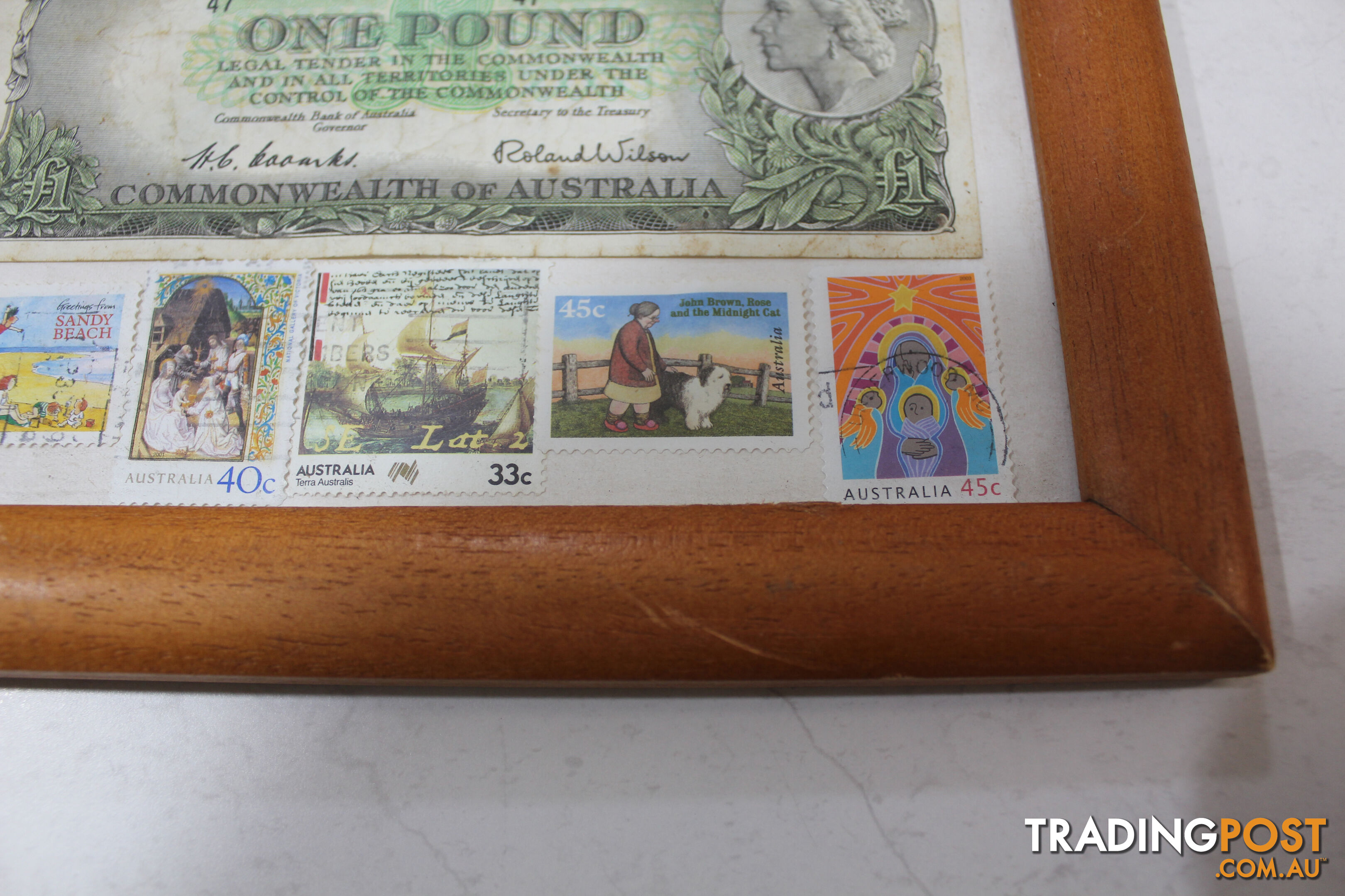 Australian Pound note and old stamps