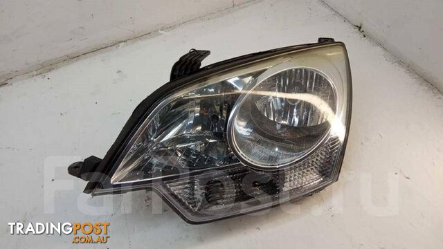 Genuine GM Headlight Left 25958478