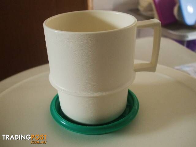 Four Tupperware Cups with Coasters/Lids