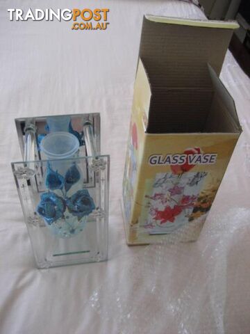 Glass Vase And Blue Flower