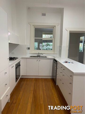 Kitchen complete with Westinghouse oven, sink and cooktop