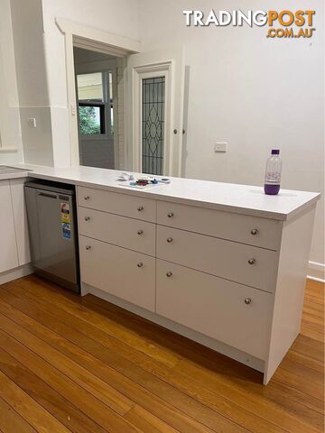 Kitchen complete with Westinghouse oven, sink and cooktop