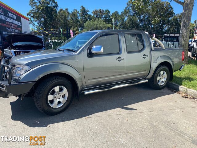 2010 Nissan Navara D40 RX Utility Dual Cab 4dr Man 6sp 4x2 973kg 2.5DT Utility - photo 4 of 14